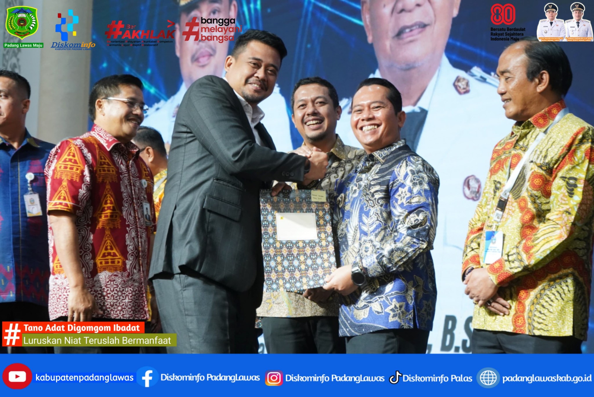 BUPATI MENGHADIRI PENYALURAN DBH OLEH BAPAK GUBERNUR SUMATERA UTARA KEPADA BUPATI/WALI KOTA SE-SUMUT
